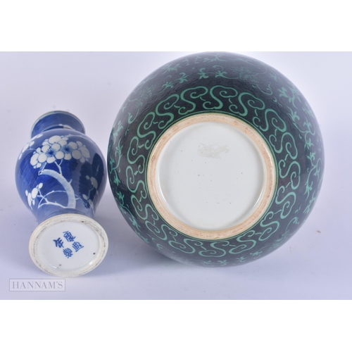 430 - A 19TH CENTURY CHINESE BLUE AND WHITE PORCELAIN PRUNUS VASE Kangxi style, together with a famille no... 