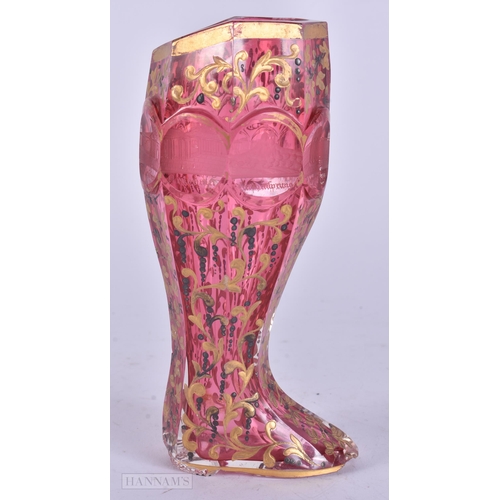 436 - A RARE 19TH BOHEMIAN RUBY AND GILDED GLASS BOOT engraved with monuments. 17.5 cm high.