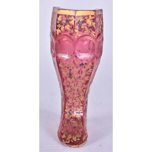 436 - A RARE 19TH BOHEMIAN RUBY AND GILDED GLASS BOOT engraved with monuments. 17.5 cm high.
