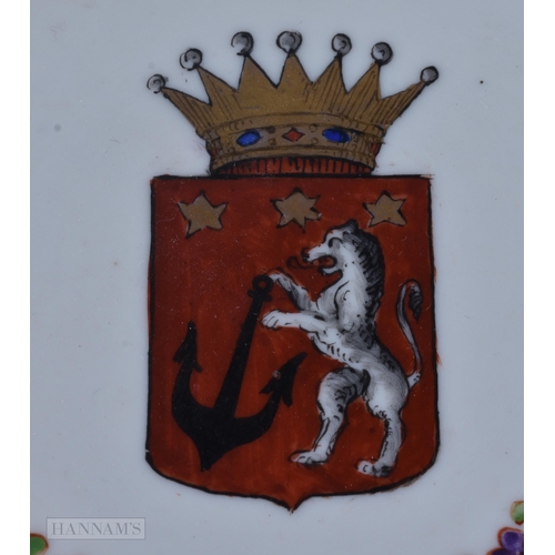 437 - AN UNUSUAL ANTIQUE ITALIAN NAPLES PORCELAIN ARMORIAL PLATE. 18 cm wide.
