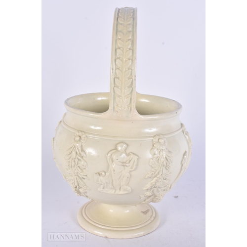 447 - A RARE EARLY 19TH CENTURY CREAMWARE POTTERY BASKET moulded with figures and flowers. 28 cm x 15 cm.