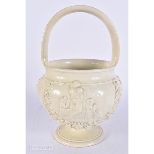 447 - A RARE EARLY 19TH CENTURY CREAMWARE POTTERY BASKET moulded with figures and flowers. 28 cm x 15 cm.