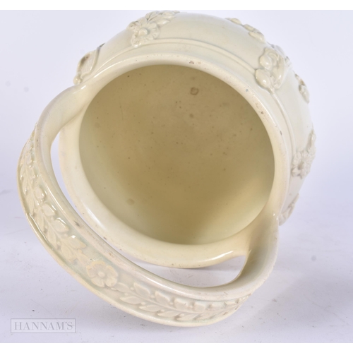 447 - A RARE EARLY 19TH CENTURY CREAMWARE POTTERY BASKET moulded with figures and flowers. 28 cm x 15 cm.
