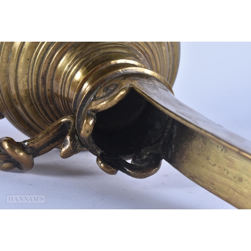 448 - AN UNUSUAL ANTIQUE MIDDLE EASTERN HIGH SPOUTED EWER. 38 cm high.