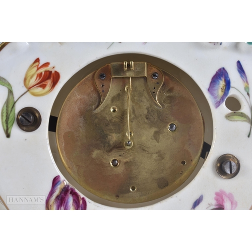 449 - A 19TH CENTURY FRENCH PORCELAIN ROCOCO MANTEL CLOCK encrusted with flowers. 30 cm x 17 cm.