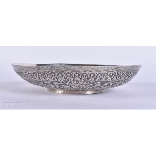 454 - AN ANTIQUE MIDDLE EASTERN WHITE METAL REPOUSSE BOWL. 127 grams. 14.5 cm wide.
