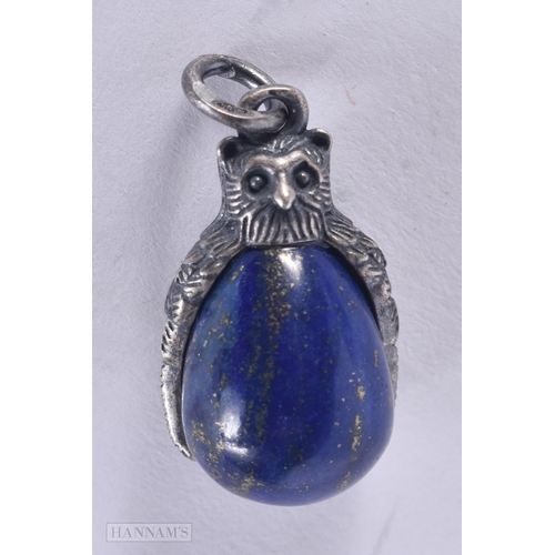 461 - A CONTINENTAL SILVER AND LAPIS PENDANT. 6.3 grams. 2.75 cm x 1.5 cm.