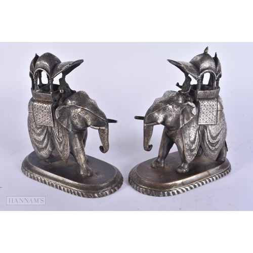 463 - A PAIR OF 19TH CENTURY INDIAN SILVERED BRONZE FIGURES OF ELEPHANTS. 16 cm x 13 cm.