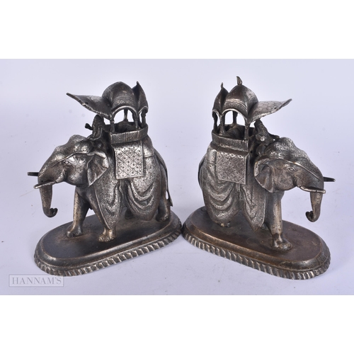 463 - A PAIR OF 19TH CENTURY INDIAN SILVERED BRONZE FIGURES OF ELEPHANTS. 16 cm x 13 cm.