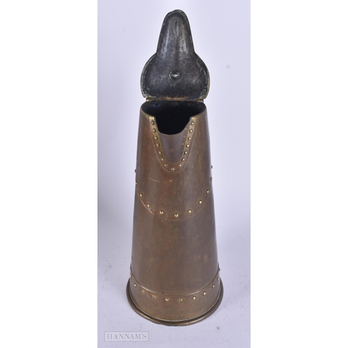 467 - A LARGE WMF BRASS JUG. 32 cm high.