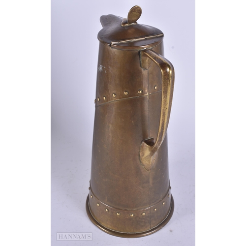 467 - A LARGE WMF BRASS JUG. 32 cm high.