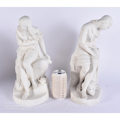 469 - A LARGE PAIR OF ANTIQUE PARIAN WARE FIGURES. 34 cm high.