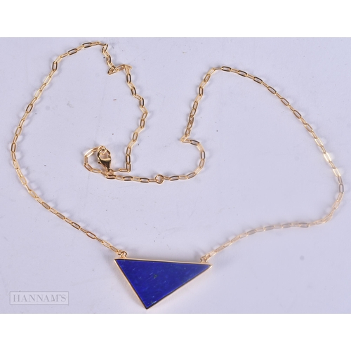 473 - A SILVER GILT AND LAPIS NECKLACE. 6.3 grams. 49 cm long.