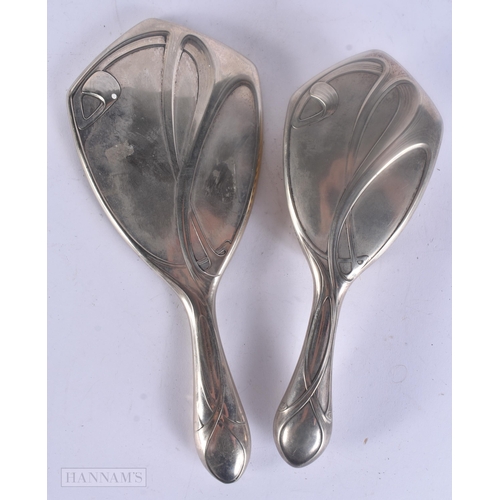 480 - TWO WMF SILVER PLATED DRESSING TABLE ITEMS. Largest 27 cm long. (2)