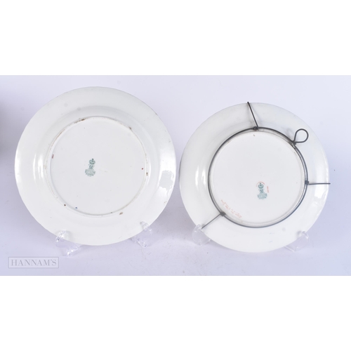 487 - A PAIR OF ROYAL CROWN DERBY PORCELAIN LANDSCAPE PLATES. 23 cm wide.