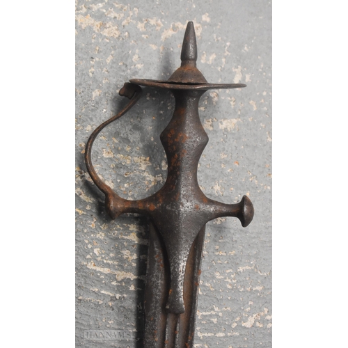 493 - AN ANTIQUE MIDDLE EASTERN SWORD. 85 cm long.  WE ARE UNABLE TO SHIP THIS LOT IN-HOUSE