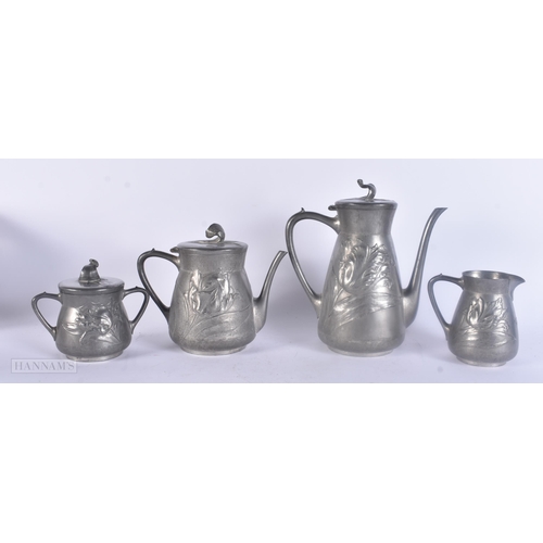 495 - AN ART NOUVEAU SILBERZINN PEWTER TEASET ON TRAY. Largest 44 cm x 40 cm. (5)