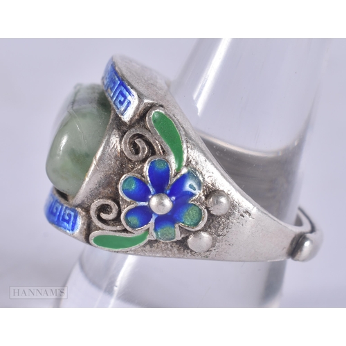 497 - A CHINESE WHITE METAL AND ENAMEL RING. 21 grams. Q.