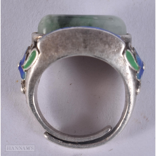 497 - A CHINESE WHITE METAL AND ENAMEL RING. 21 grams. Q.