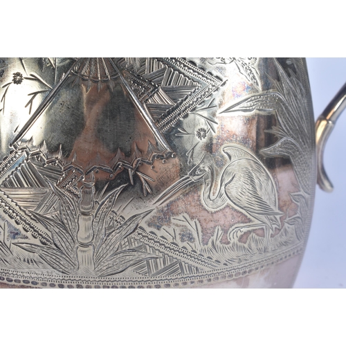 500 - A VICTORIAN AESTHETIC MOVEMENT DRESSER STYLE SILVER PLATED TEASET. Largest 24 cm x 21 cm. (4)