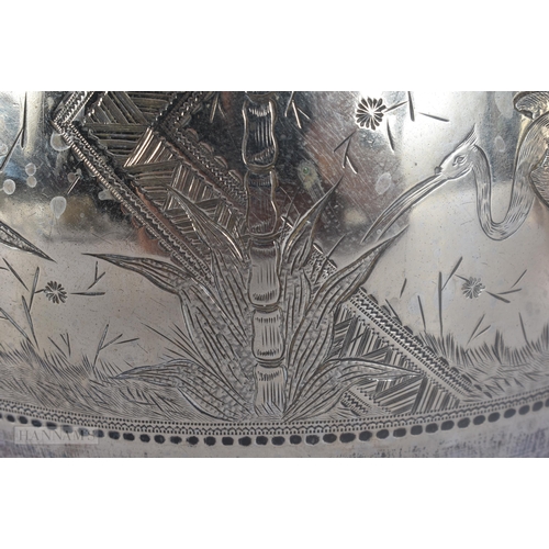 500 - A VICTORIAN AESTHETIC MOVEMENT DRESSER STYLE SILVER PLATED TEASET. Largest 24 cm x 21 cm. (4)