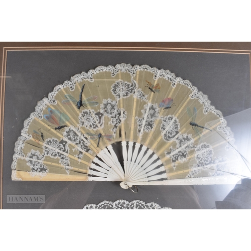 501 - A FRAMED PAIR OF VICTORIAN LACE FANS. 68 cm x 60 cm.