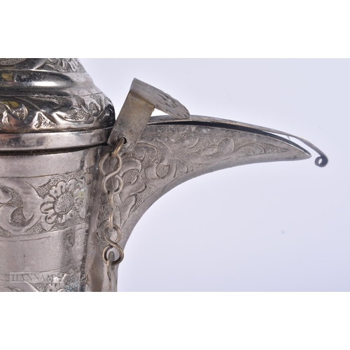 505 - A MIDDLE EASTERN WHITE METAL EWER. 719 grams. 29 cm high.
