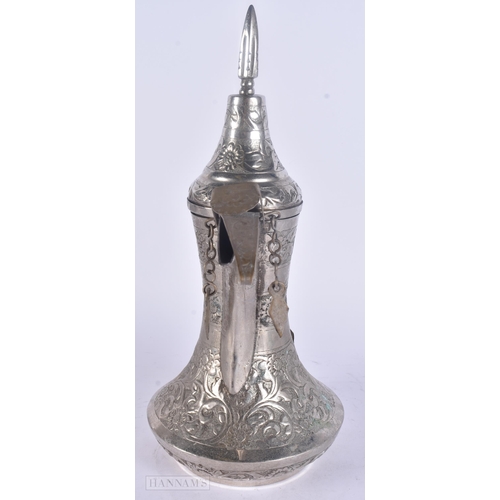 505 - A MIDDLE EASTERN WHITE METAL EWER. 719 grams. 29 cm high.