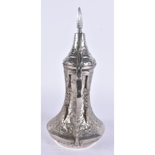 505 - A MIDDLE EASTERN WHITE METAL EWER. 719 grams. 29 cm high.
