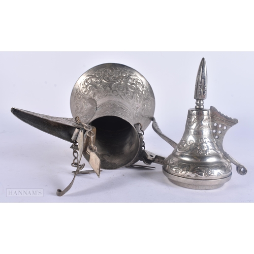 505 - A MIDDLE EASTERN WHITE METAL EWER. 719 grams. 29 cm high.