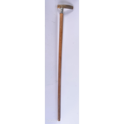 507 - A VICTORIAN SILVER MOUNTED RHINOCEROS HORN WALKING CANE. 88 cm long.