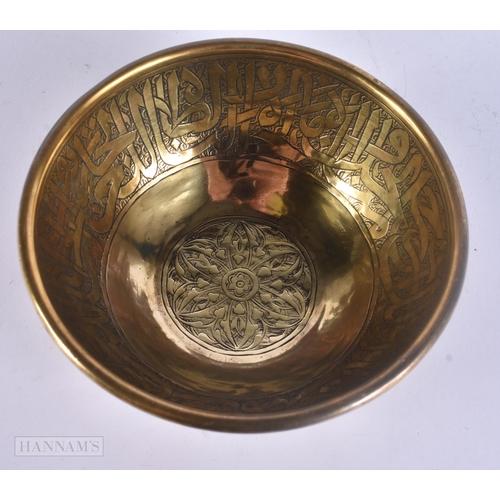 510 - A 19TH CENTURY ISLAMIC SILVER INLAID MIXED METAL BOWL decorated with scripture. 12 cm diameter.