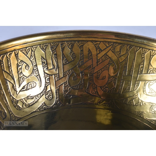 510 - A 19TH CENTURY ISLAMIC SILVER INLAID MIXED METAL BOWL decorated with scripture. 12 cm diameter.