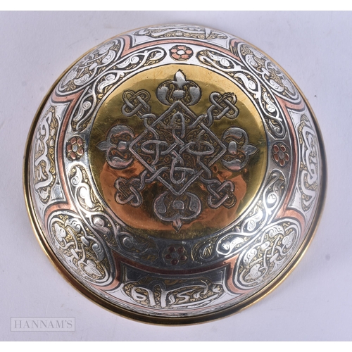 510 - A 19TH CENTURY ISLAMIC SILVER INLAID MIXED METAL BOWL decorated with scripture. 12 cm diameter.