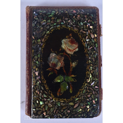 522 - A VICTORIAN TOOLED LEATHER CARD CASE together with a papier mache leather aide memoire. 10 cm x 8 cm... 