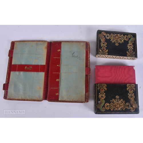522 - A VICTORIAN TOOLED LEATHER CARD CASE together with a papier mache leather aide memoire. 10 cm x 8 cm... 