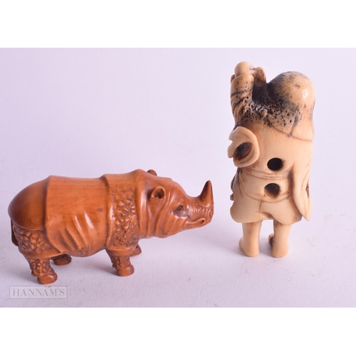 530 - A 19TH CENTURY JAPANESE MEIJI PERIOD CARVED STAG ANTLER NETSUKE together with another. Largest 7.25 ... 