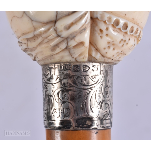 665 - A RARE VICTORIAN SILVER MOUNTED EROTIC VAGINA WALKING CANE. 88 cm long.