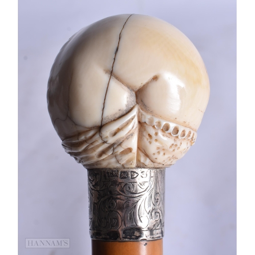 665 - A RARE VICTORIAN SILVER MOUNTED EROTIC VAGINA WALKING CANE. 88 cm long.