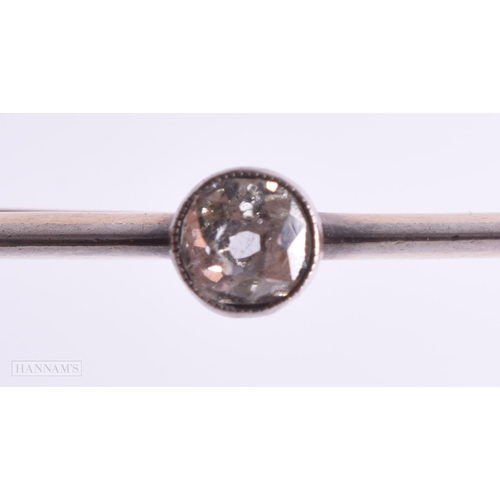 767 - A GOLD AND DIAMOND BAR BROOCH. 4 grams. 5.25 cm x 0.5 cm.