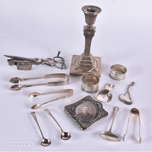 898 - A Victorian Silver Column Candlestick (weighted) hallmarked London 1891,Three Silver Tongs, 2 Silver... 