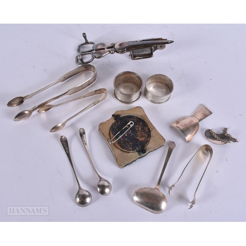 898 - A Victorian Silver Column Candlestick (weighted) hallmarked London 1891,Three Silver Tongs, 2 Silver... 