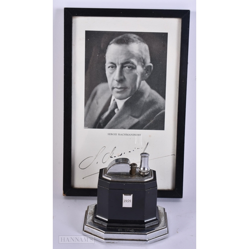 904 - A 1950S RONSON LIGHTER together signed photo card of Sergei Rachmaninoff. (2)