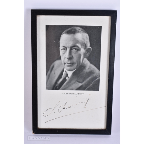 904 - A 1950S RONSON LIGHTER together signed photo card of Sergei Rachmaninoff. (2)