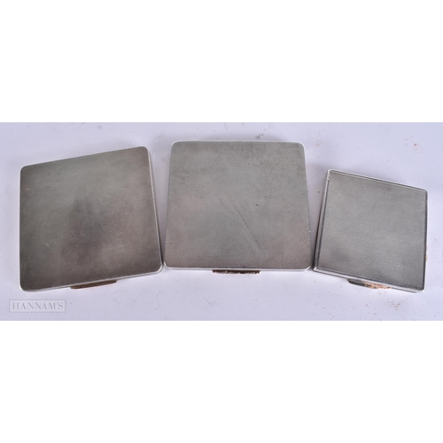 906 - THREE ART DECO SILVER COMPACTS. 399 grams. Largest 9 cm square. (3)
