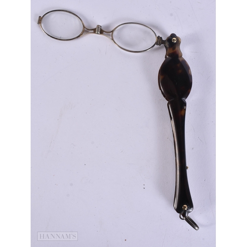 911 - A PAIR OF TORTOISESHELL LORGNETTES. 18 cm long extended.