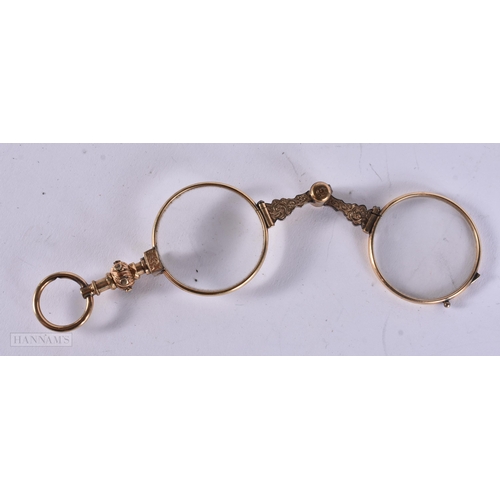 912 - A PAIR OF ANTIQUE YELLOW METAL LORGNETTES. 12 cm long extended.