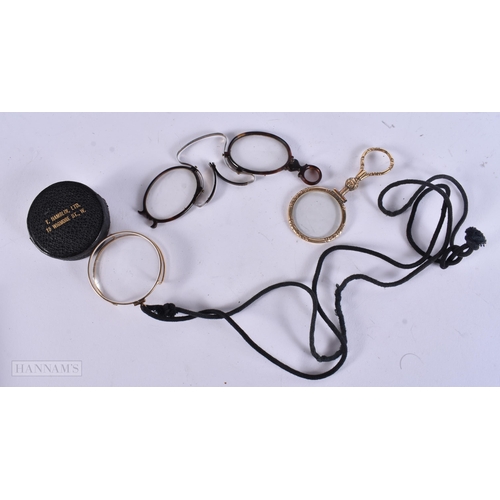 913 - A PAIR OF ANTIQUE TORTOISESHELL PINCH GLASSES together with two lenses. (3)