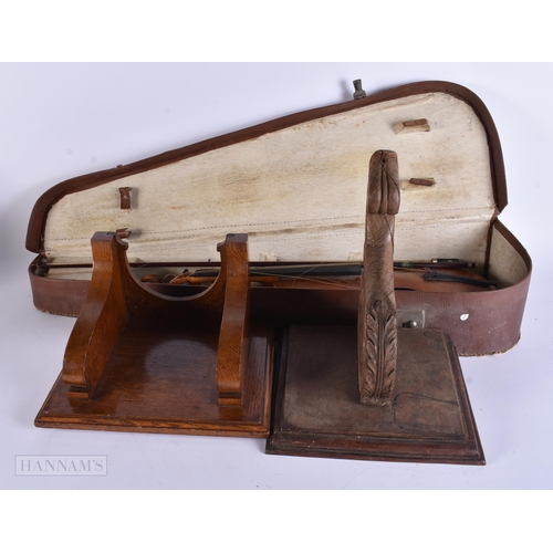 914 - A VIOLIN together with two wall brackets. (3)