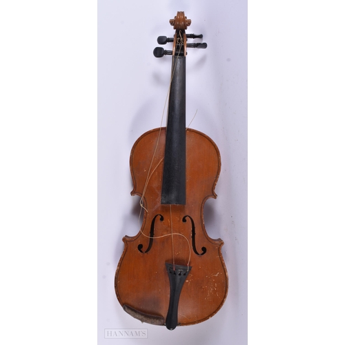 914 - A VIOLIN together with two wall brackets. (3)